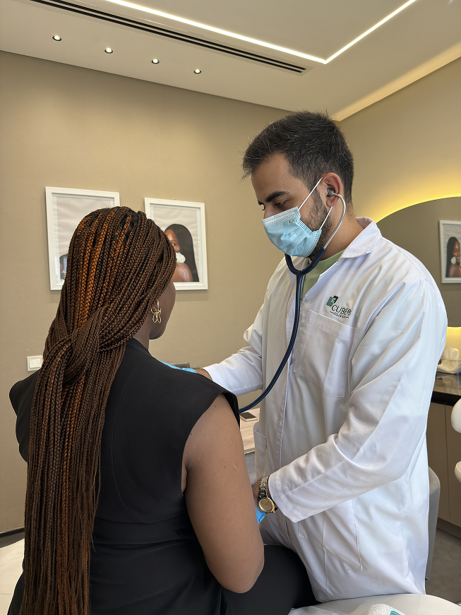A Cube65 clinic specialist consulting with a patient